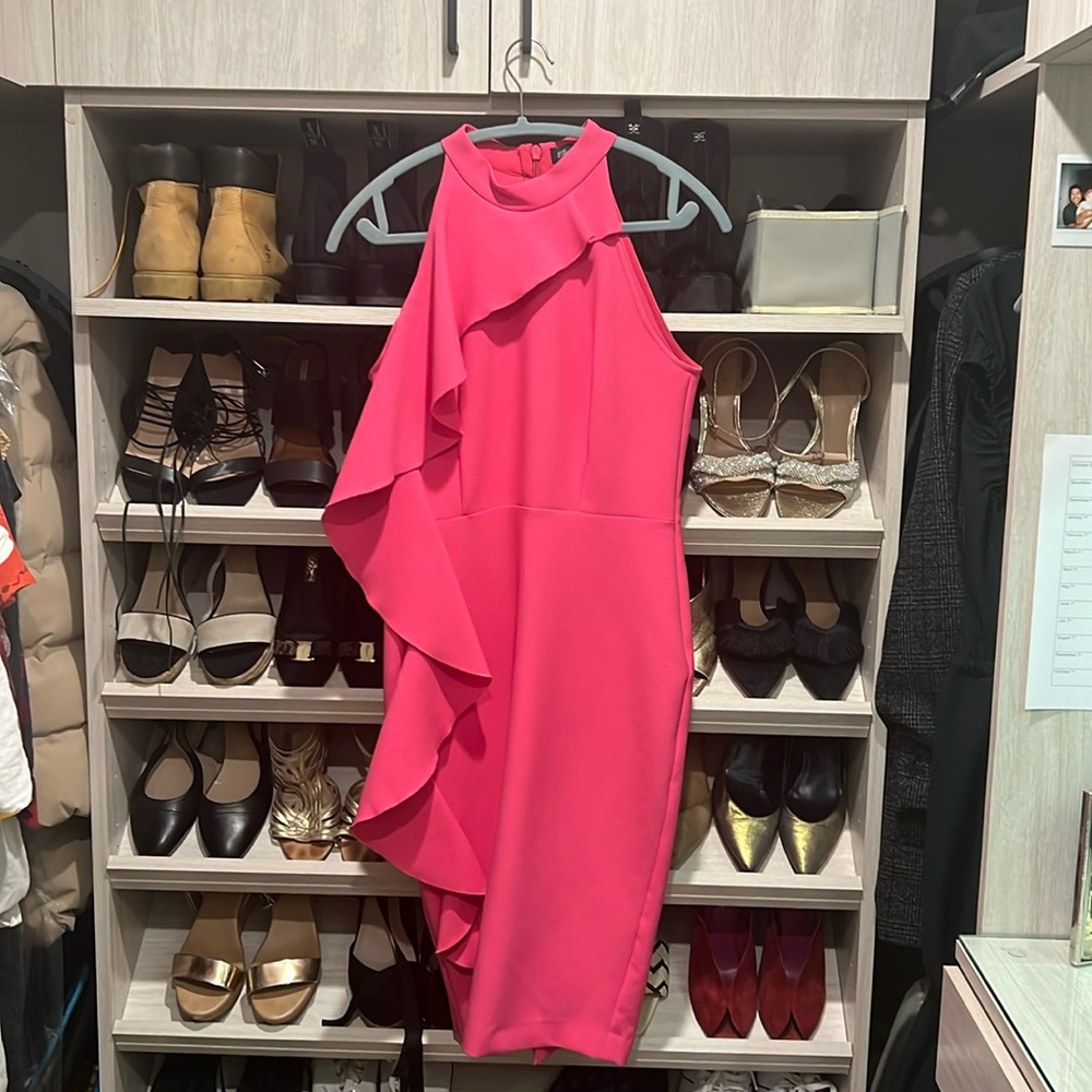 Pink bodycon knee length dress with ruffle. Thick crepe material
